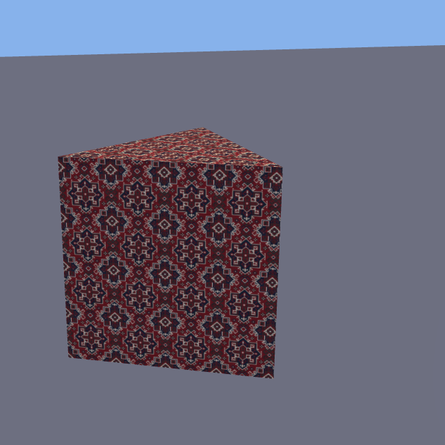 A triangular prism on a gray platform covered in a dark red ornamental carpet-style texture. The pattern visibly repeats in a four-by-four grid on the front face, showing texture tiling at four times in each direction.